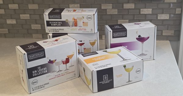 Bartesian cocktail pod boxes stored on a kitchen counter at room temperature